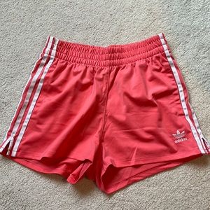 Pink Adidas track shorts